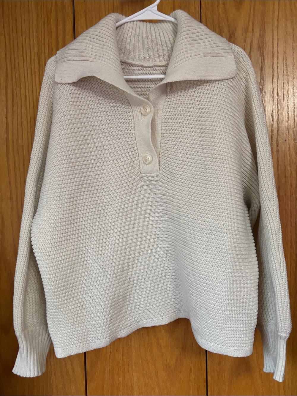 White collared sweater